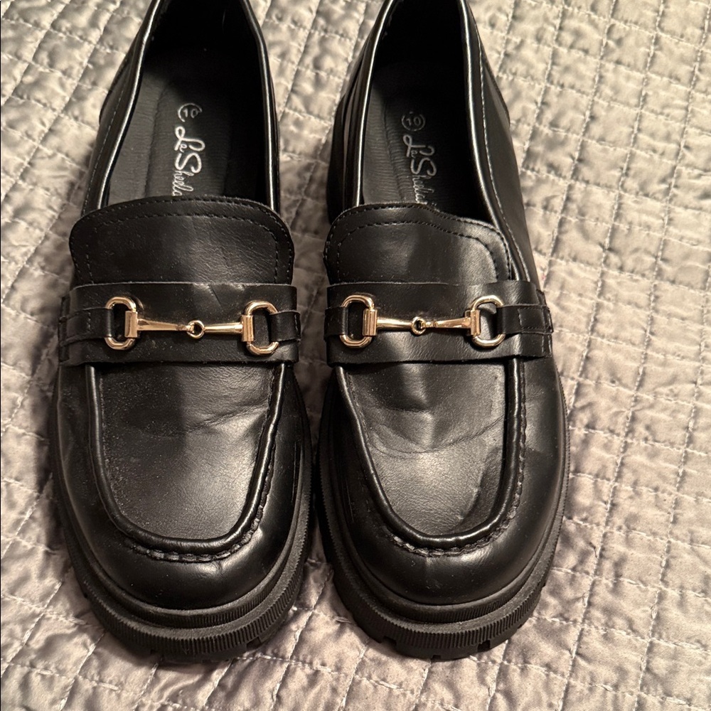 Black Loafers with Gold Buckle Detail